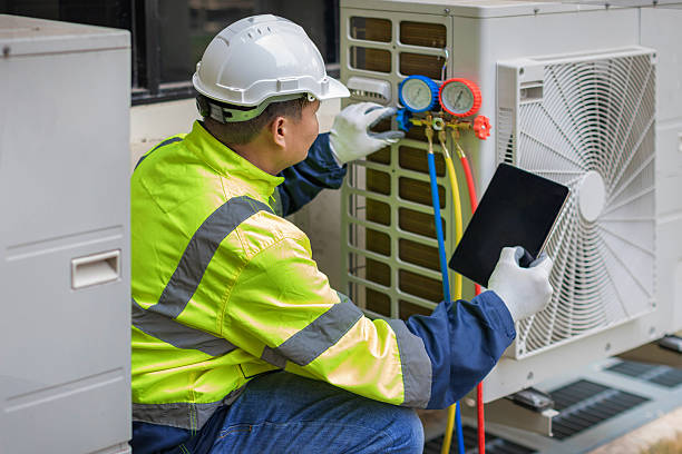 Professional Heat Pump Repair technician working in Shokan, NY
